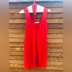 Red silk dress. Tulip shape.